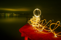 Lightpainting mit Feuerball und Funkenspur am Starnberger See - Andy Ilmberger